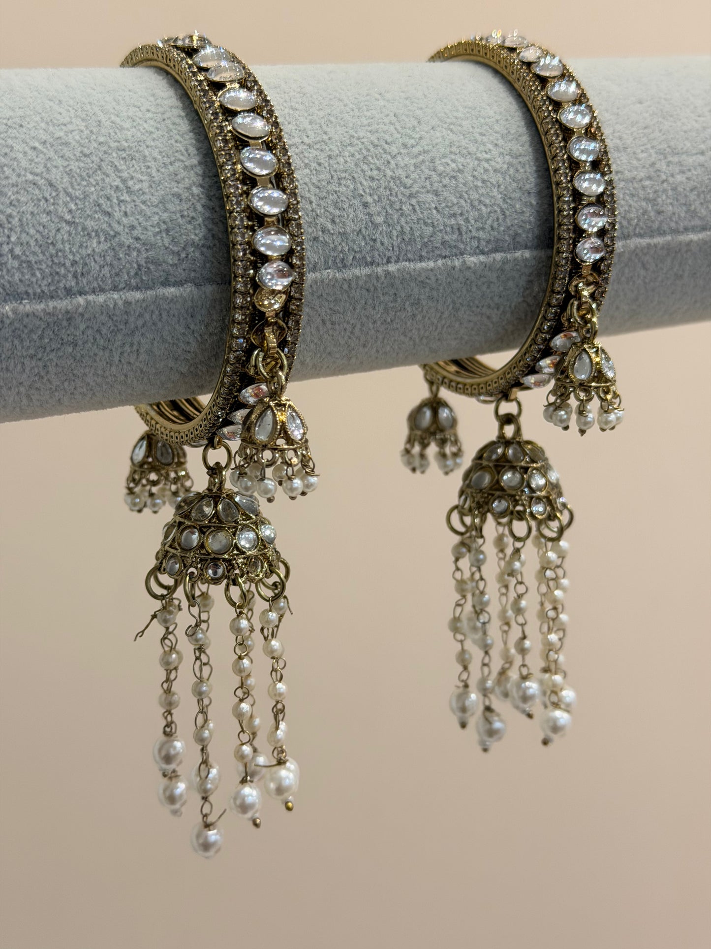 Antik-Gold triple Jhumka and hanging pearls Bangles